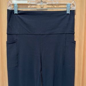 Athleta Salutation Stash Flare pant, black, size medium.